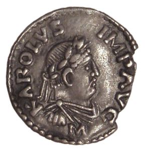 A denier of Charlemagne, depicting him in the flowing cloth and laurel crown of a Roman Emperor. Early 9th c. (Wikimedia) 